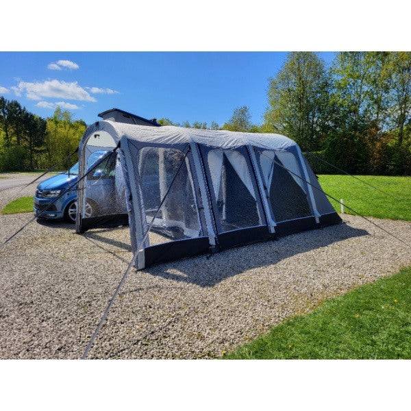 Sunncamp Touring Motor Air Driveaway Awning exterior view showing inflatable beam construction and guy rope setup