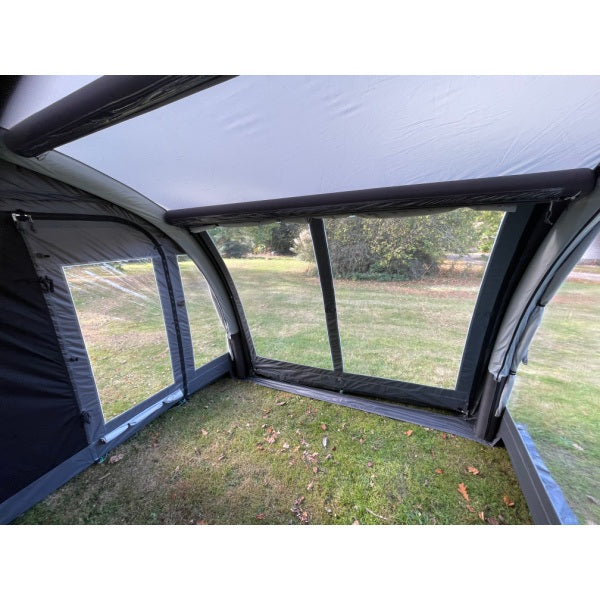  Interior perspective of Sunncamp Ultima 260 Air Awning showing full depth and windows