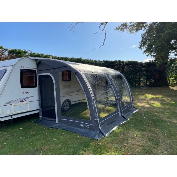 Left side perspective of the Sunncamp Ultima 390 Air Awning with open entrance panel
