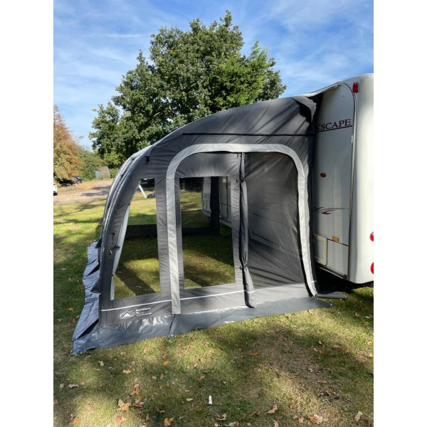 Right side view of the Sunncamp Ultima 390 Air Awning displaying full attachment to caravan
