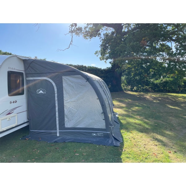 Side angled view of the Sunncamp Ultima Pro Air 390 showing curved roof design and window configuration
