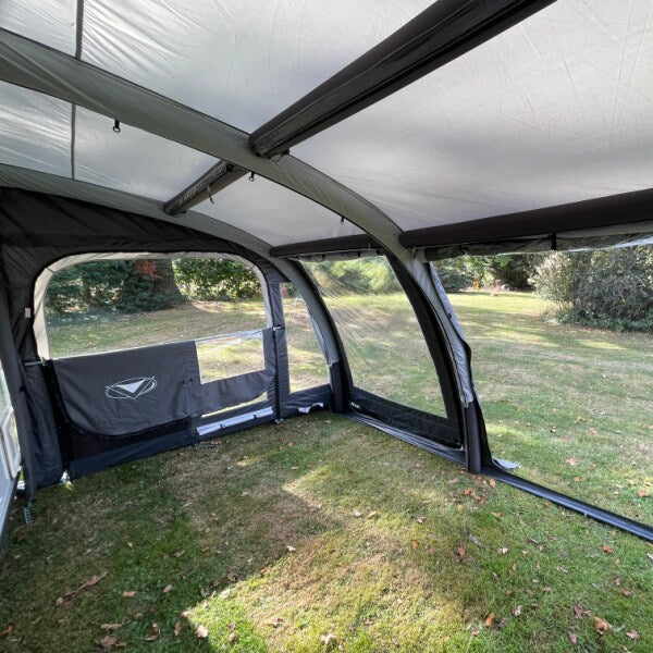 Interior view of the Sunncamp Ultima Pro Air 390 showcasing the structural air beam system and spacious living area