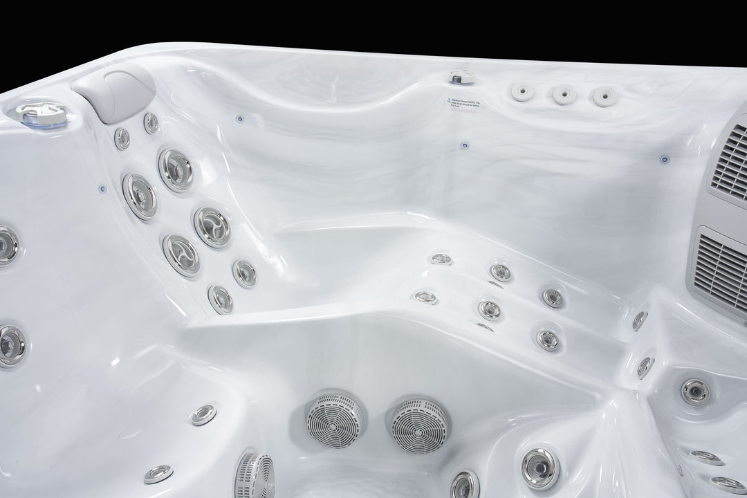 Wide interior angle of Luso Spas The Hydra Hot Tub showing ergonomic seating and jet placements.