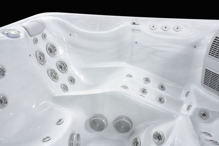 Wide interior angle of Luso Spas The Hydra Hot Tub showing ergonomic seating and jet placements.