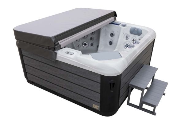 Luso Spas The Platinum 3 Hot Tub in white acrylic with partially opened grey cover and steps, angled side view, on a white background.