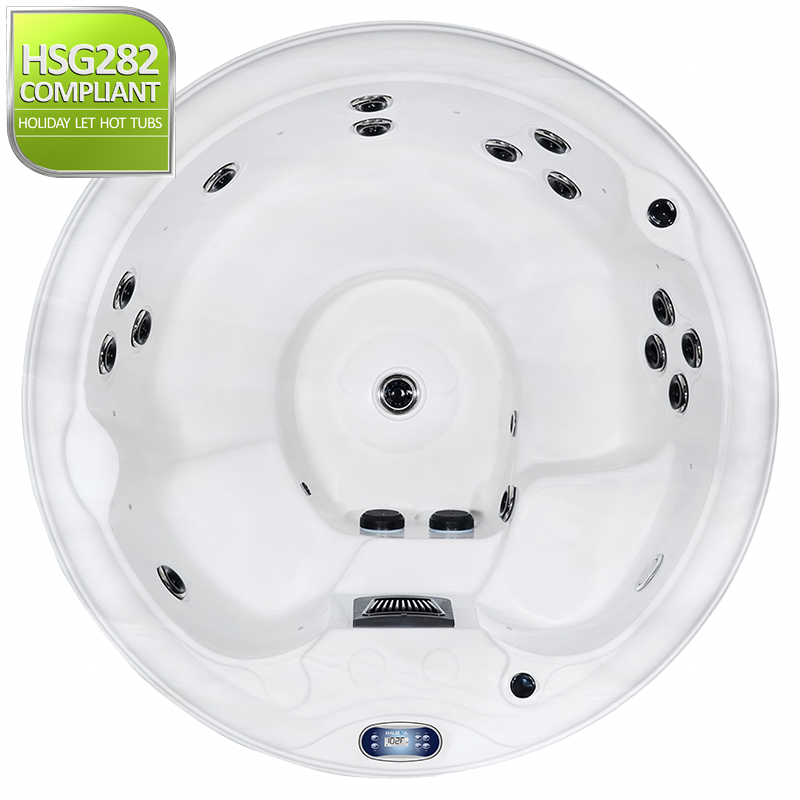Overhead view of Luso Spas The Solas Plug & Play Hot Tub in white acrylic finish with multiple jets, central seating area, and Balboa control panel, HSG282 compliant label visible.