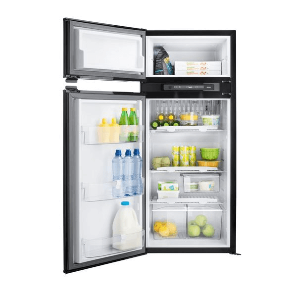 Thetford BL FRIDGE N4175A CURVE NOFRAME, open, showing fully stocked interior with drinks, fruits, and packaged goods – on a white background.