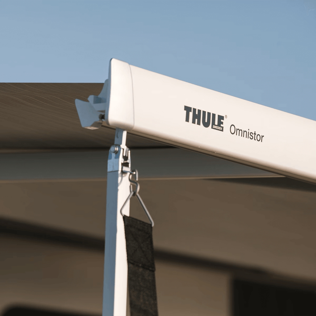 Close-up of Thule Omnistor awning with storm strap attached.