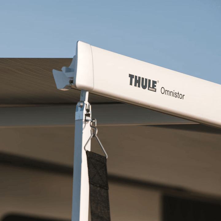 Close-up of Thule Omnistor awning with storm strap attached.
