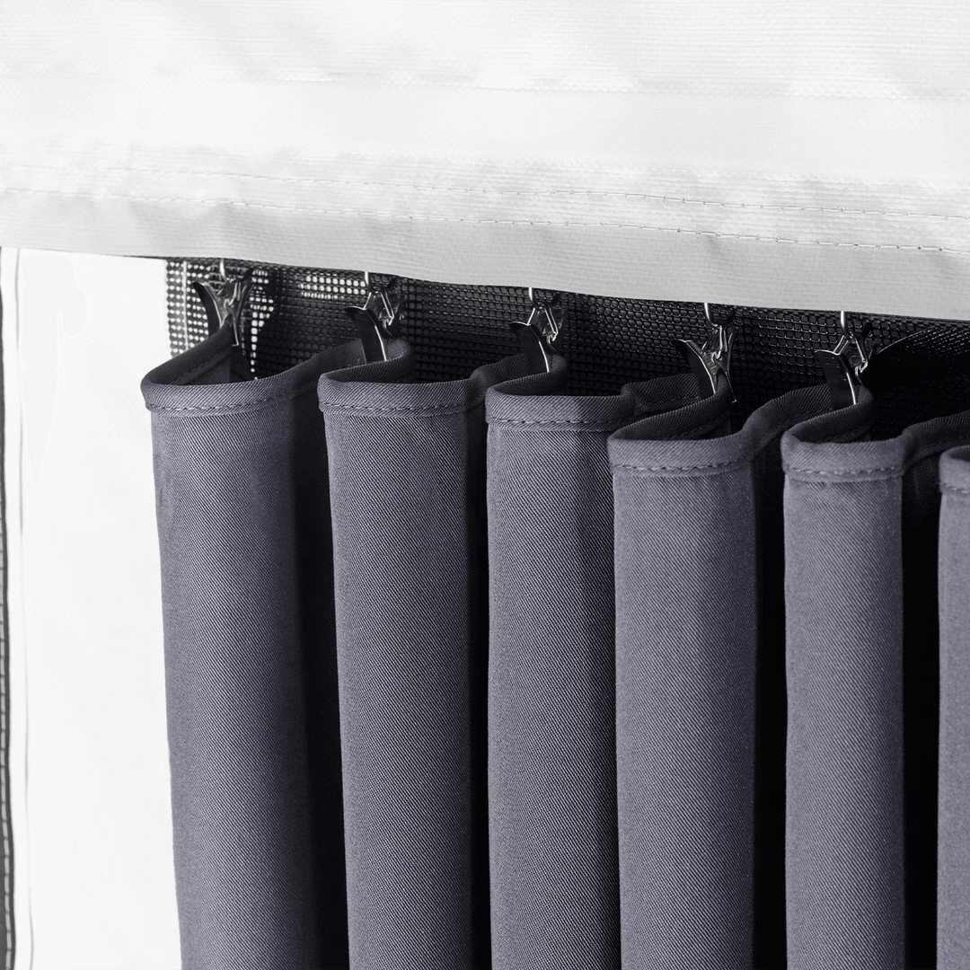 Close-up of Thule awning room curtains hanging on hooks.