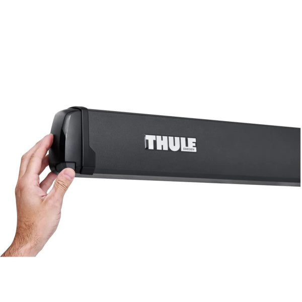 Thule Omnistor 3200 shown with a hand touching the corner