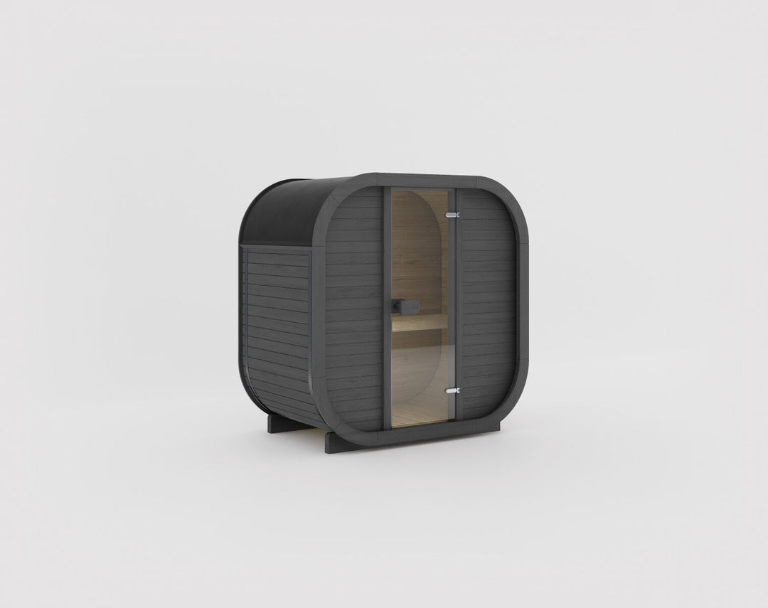 Ula Mini Outdoor Sauna ebony finish dark wood compact sauna with glass door on a white background.