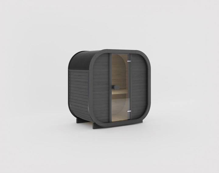 Ula Mini Outdoor Sauna ebony finish dark wood compact sauna with glass door on a white background.