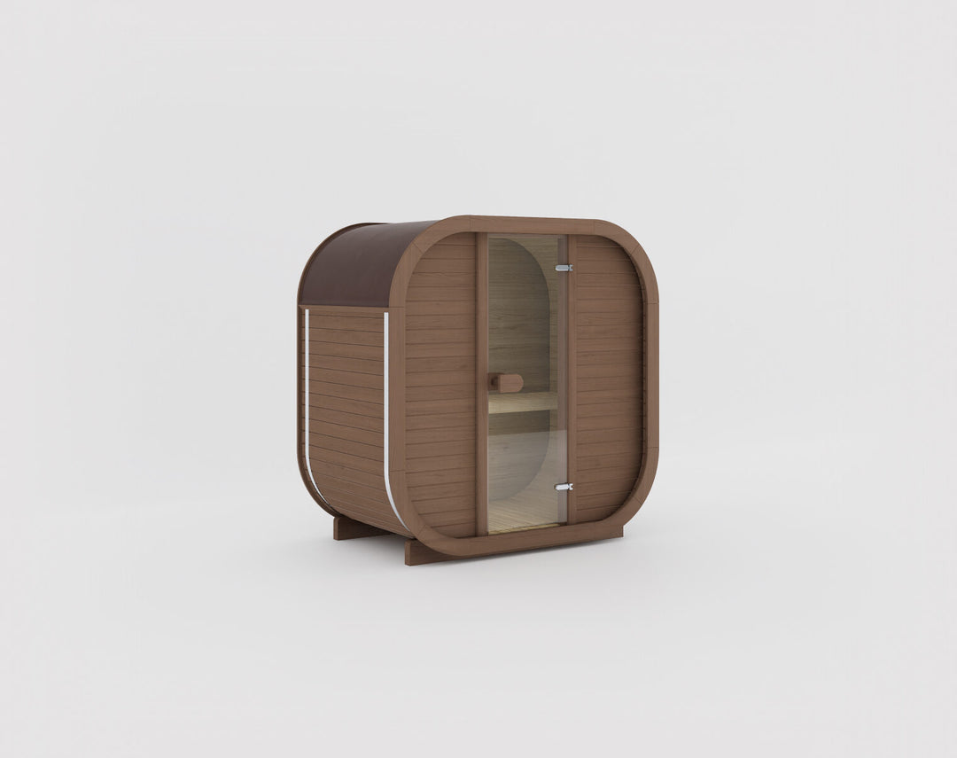 Ula Mini Outdoor Sauna teak finish curved wooden sauna cabin with glass door on a white background.