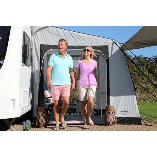 A couple standing in front of a Vango Balletto 200