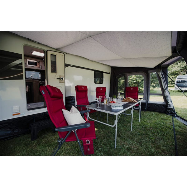 Inside of a Vango Tuscany Air Awning with chairs and table