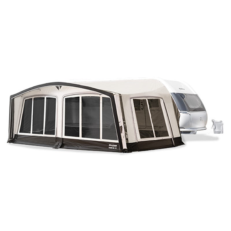 Caravan with an attached westfield pluto xl awning on a white background