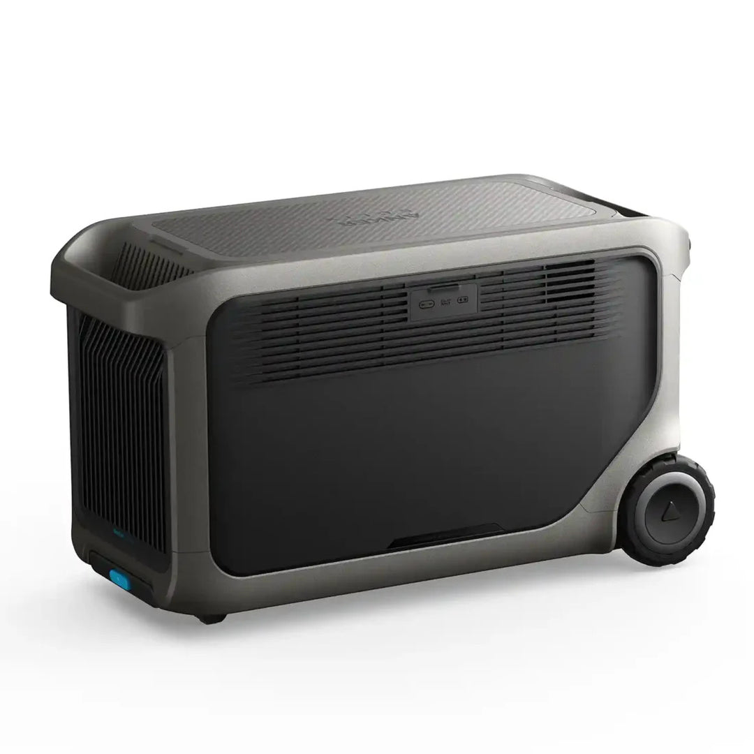 Anker SOLIX F3000 Portable Power Station rear three-quarter view highlighting its ventilation grilles, durable housing and integrated wheels on a white background.