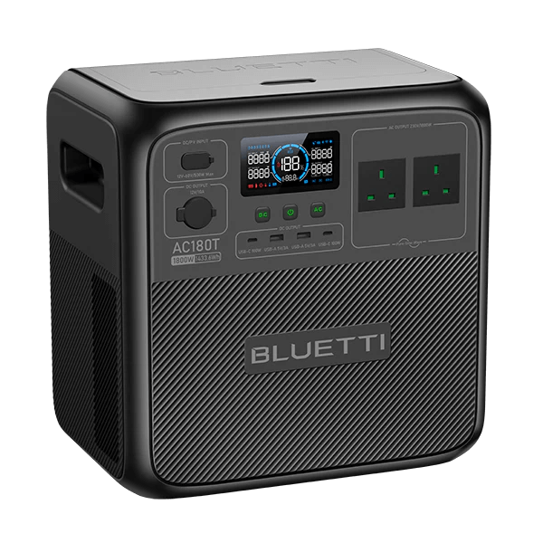 Bluetti AC180T portable power station angled view showing input/output ports and screen display on a transparent background.
