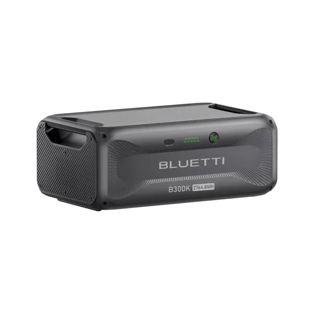 Rear angled view of Bluetti B300K battery station highlighting the side vents and handles on a transparent background.