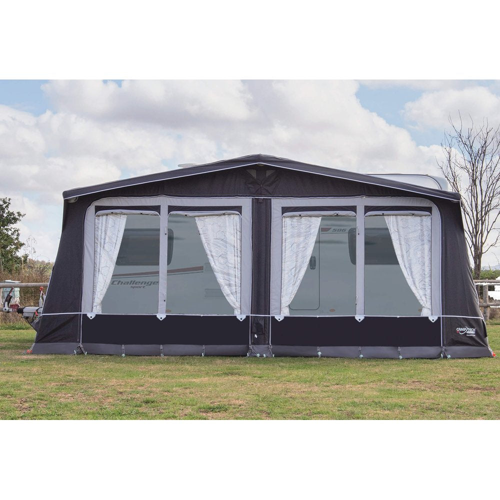 Camptech Hampton DL full caravan awning with white curtains, attached to a Swift Challenger Sport caravan