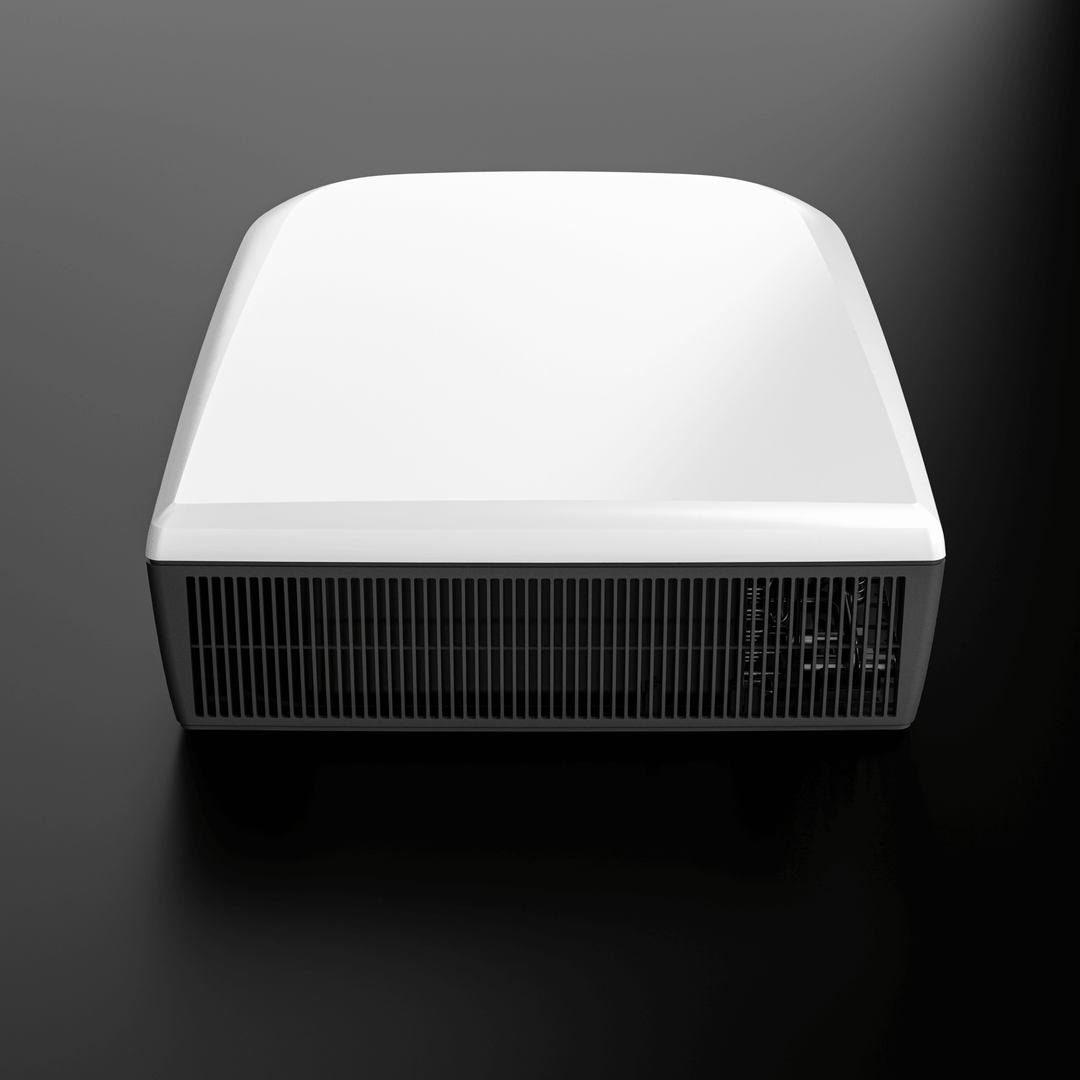 Front view of the Dometic FreshJet FJX7 3000 in white finish with matching dark base. Showcasing the smooth upper surface and frontal grille detail, photographed against a black-to-grey gradient plain background.