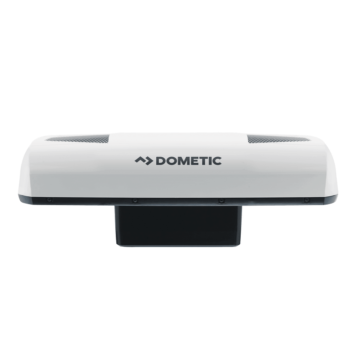 Front view of the Dometic CoolAir RTX 2000 12V  in white, showing sleek aerodynamic design with dual top air vents and the Dometic logo centered on the front panel, on a transparent background