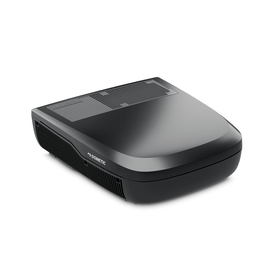 Angled product view of the Dometic FreshJet FJX4 2200 in black, showcasing its sleek aerodynamic body and front vent panel on a transparent background.