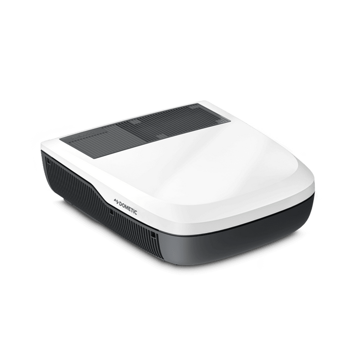 Three-quarter angle view of the white Dometic FreshJet FJX4 2200 rooftop air conditioner, highlighting its contoured aerodynamic design and vent details, on a transparent background.