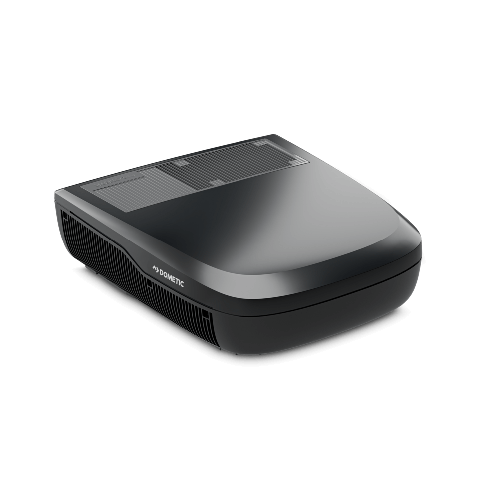 Three-quarter perspective of the Dometic FreshJet FJX7 2200 in black, emphasizing the unit’s low-profile silhouette and stylish black finish, on a transparent background.