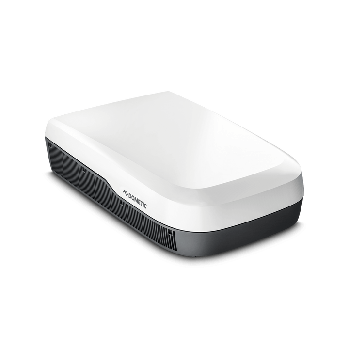Angled view of the Dometic FreshJet FJX7 3500 in white. The unit features a glossy white upper shell and grey vented base, emphasizing a modern and clean design, with a transparent background.