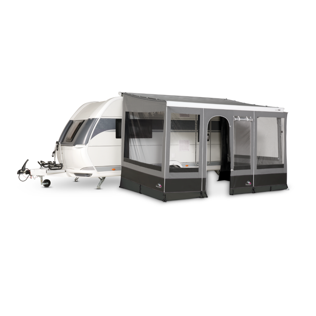 Dorema Contour fitted to a white touring caravan, with grey window panels, a side entrance, and a spacious enclosed living area on a white background.