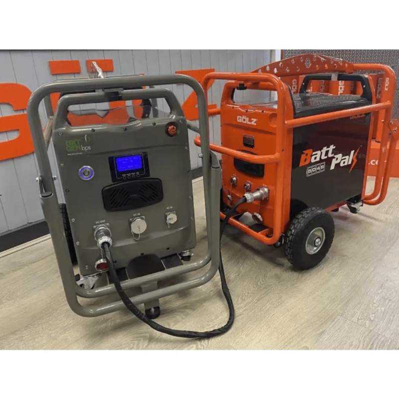 GOLZ BattPak 5048 connected next to another portable battery system in an indoor industrial setting.