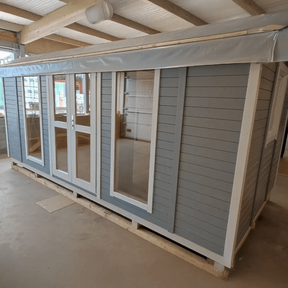 InMedias Wagon Log Sauna exterior in natural wood.