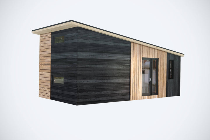 3D render of a modern small cabin with black and natural wood vertical cladding and a sloped roof, on a white background.