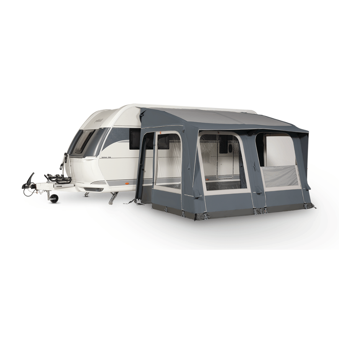Starcamp Navigator Air 390 attached to a white touring caravan, featuring a dark grey roof, large clear windows, and a spacious enclosed living area on a white background.