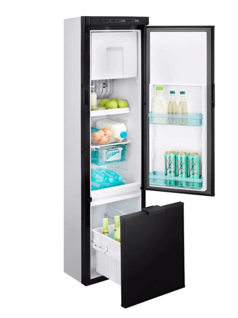 Thetford THET.FRIDGE N4141A FLAT FRAMED – Open fridge view fully stocked with drinks, vegetables, and eggs, bottom drawer pulled out. With white background.