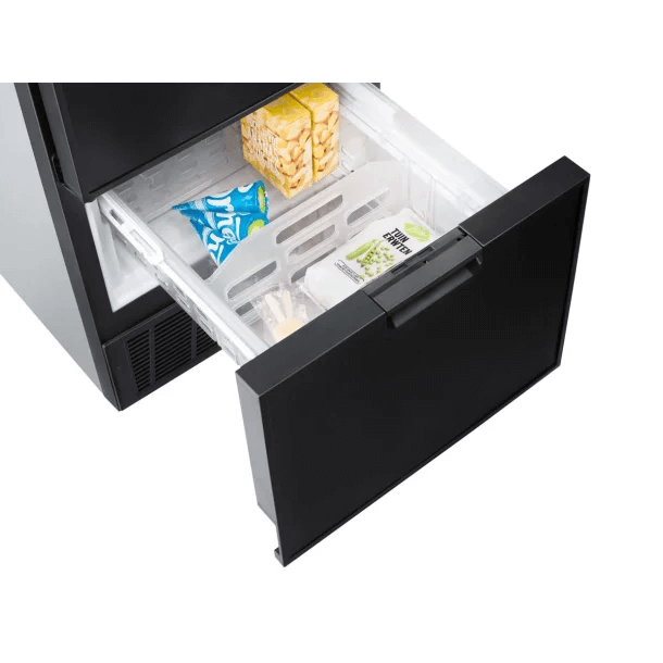 The freezer drawer of the Thetford T2175 12V fridge pulled open, showing frozen food items neatly stored in a transparent compartment, on a white background.