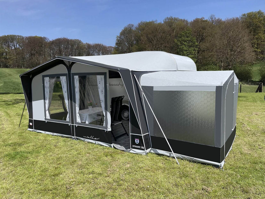 Walker Dynamic 250 Awning with annex connected to Beachy caravan on grassy campsite.